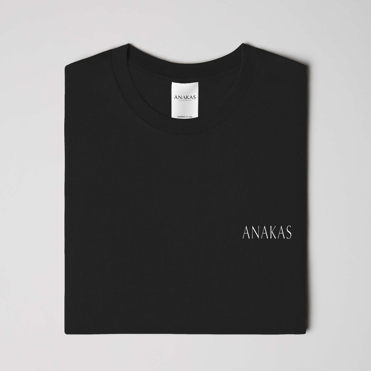 ANAKAS Oversized Tee in Black, folded view