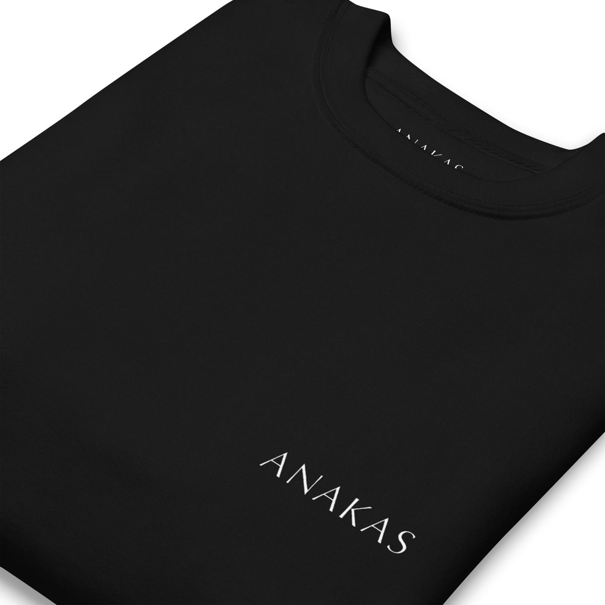 ANAKAS Essential Crewneck in Black, folded view